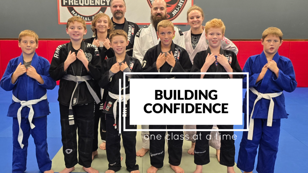 Children practicing Brazilian Jiu Jitsu at Frequency Martial Arts in Bloomington, IL, learning discipline, confidence, and self-defense.