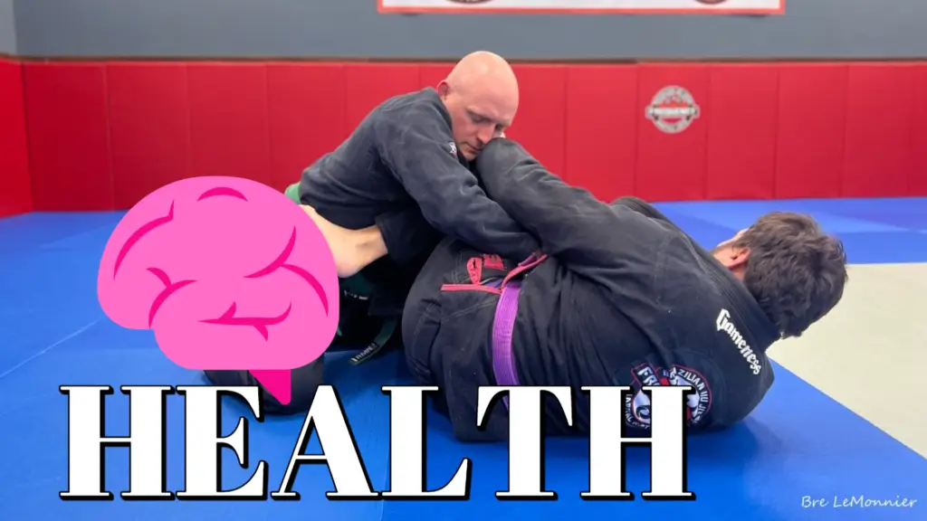 Adults practicing Brazilian Jiu Jitsu at Frequency Martial Arts in Bloomington, IL, improving fitness, self-defense, and confidence.