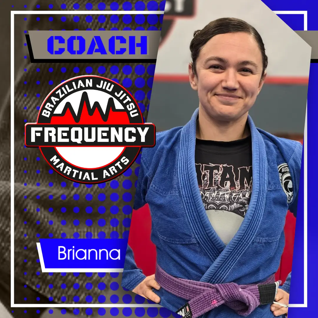 Coach Brianna at Frequency Martial Arts in Bloomington, IL, teaching Brazilian Jiu Jitsu with expert instruction and personalized training.