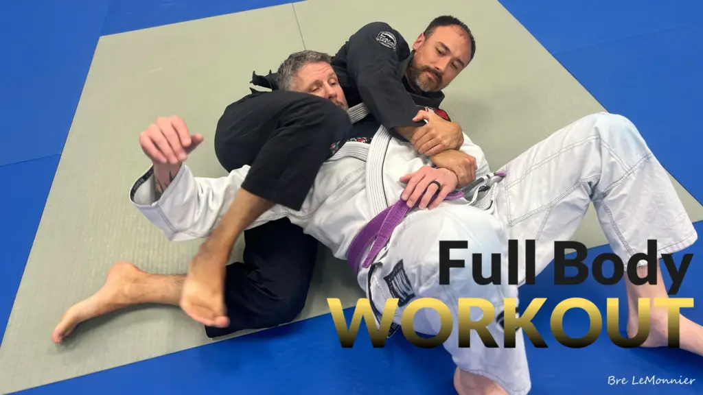 Adults practicing Brazilian Jiu Jitsu at Frequency Martial Arts in Bloomington, IL, improving fitness, self-defense, and confidence.