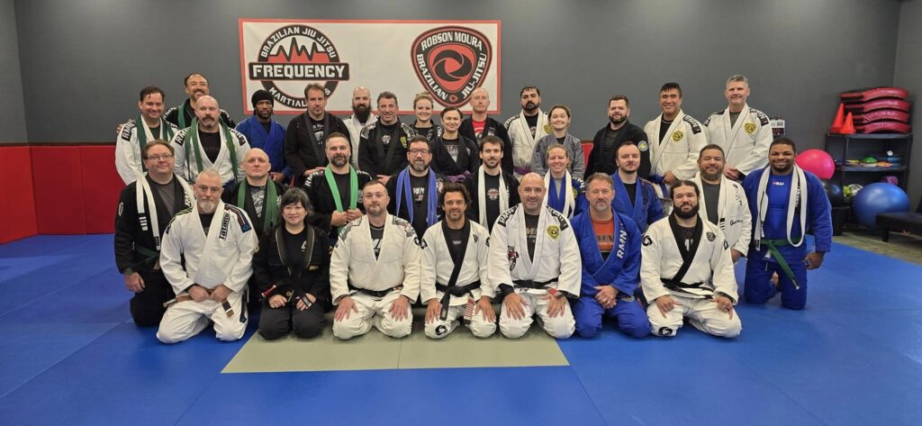 Adult Brazilian Jiu Jitsu teammates at Frequency Martial Arts in Bloomington, IL.