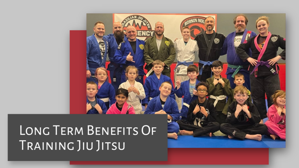 Two young martial artists in gi uniforms practicing Brazilian Jiu Jitsu at Frequency Martial Arts, focusing on technique and control.